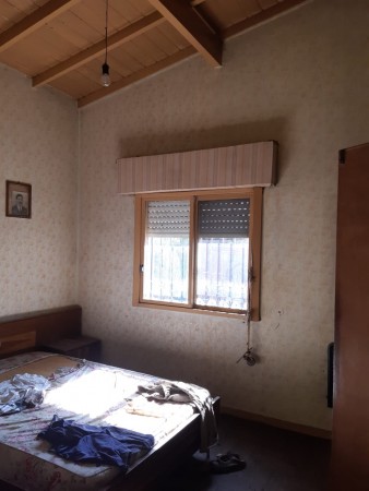 VENTA DE LOTE EN SAN MIGUEL CON CASA A REFACCIONAR